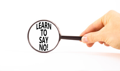 Learn to say no symbol. Concept words phrase Learn to say no in beautiful magnifying glass....