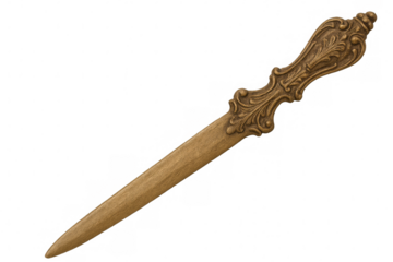 Golden letter opener featuring intricate handle, resting on transparent backdrop, highlighting refined stationery accessory
