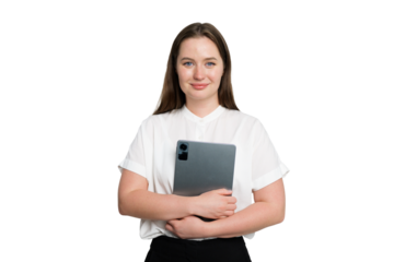 Confident young woman holds tablet while posing for a casual portrait in a bright studio setting during daytime