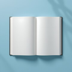 Open Book Mockup on Blue: A clean and simple mockup showcasing an open hardback book with blank, white pages against a light blue background, perfect for showcasing your own designs or text.