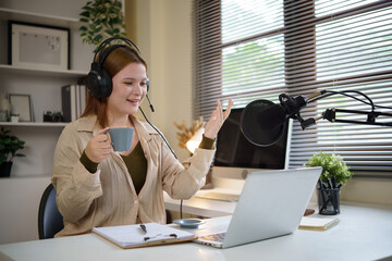 Confident host discussing topics for her podcast while streaming in a stylish office.