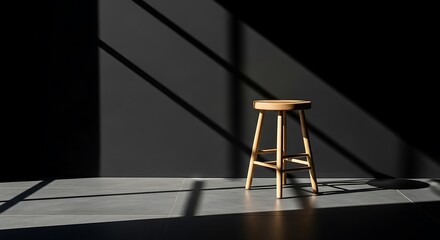 Minimalist Wooden Stool with Shadow Play against Dark Gray Wall