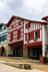Fototapeta premium Traditional Basque Labourdine Houses Around the Arches Square in La Bastide-Clairence