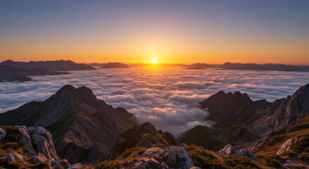 Sunrise above mountain cloud sea