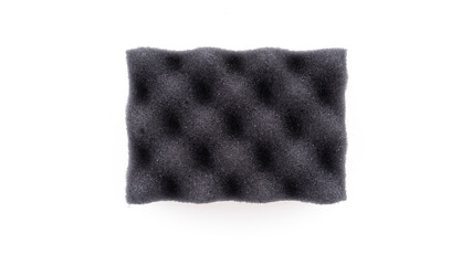 Unique black foam sponge with a textured surface for various cleaning tasks and applications in home and workshop environments