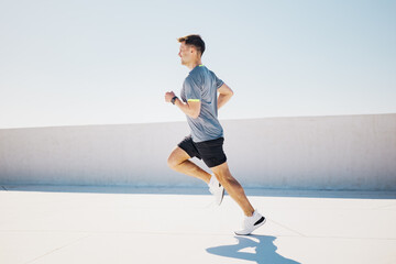 Runner enjoys training on a bright day atop a rooftop in the city, showcasing determination while...