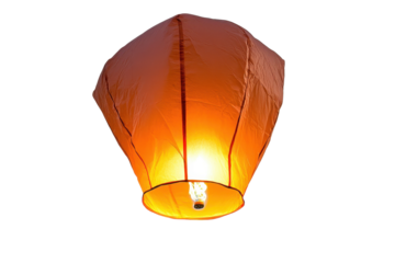Sky lantern glows brightly against a clear background, showcasing its delicate design and warm illumination, perfect for celebrations and events like weddings and festivals
