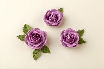 Fototapeta premium Triangular Arrangement of Purple Roses on Light Beige Background