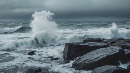Powerful ocean waves crashing against rocks during a stormy day at sea.