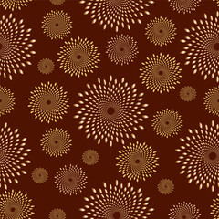 Golden swirled circles on a brown background.