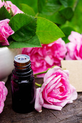 Rose essential oil in a bottle.essential oils.