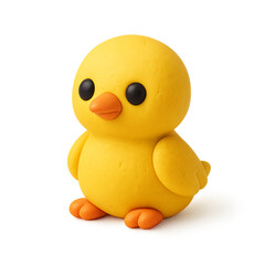 A yellow chick figurine with black eyes and an orange beak sits on a white surface.