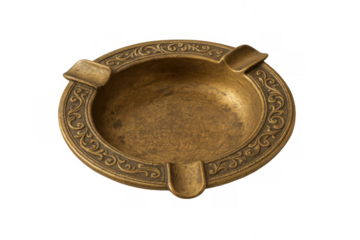 Ornate brass ashtray with decorative engravings, isolated on a transparent background, ready for compositing