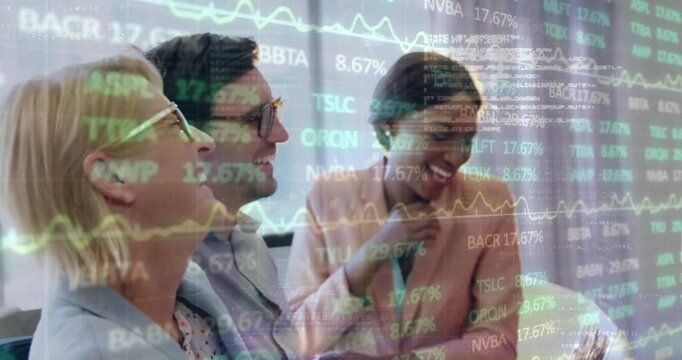 Team leaning into laptop after male tapping keyboard, showing stock chart and celebrating profit