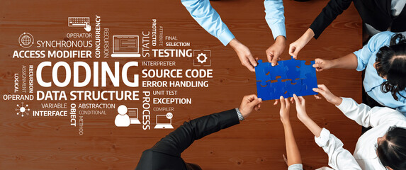 A diverse team collaborates on a coding challenge, piecing together a puzzle that symbolizes...