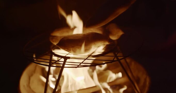 Traditional Fire-Roasted Sweet Potatoes on Open Flame