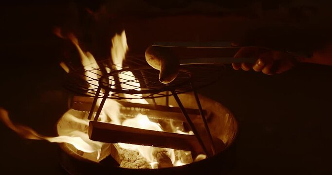Traditional Fire-Roasted Sweet Potatoes on Open Flame