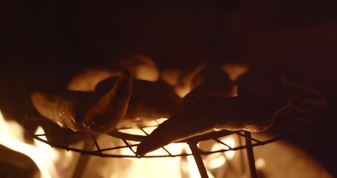 Traditional Fire-Roasted Sweet Potatoes on Open Flame