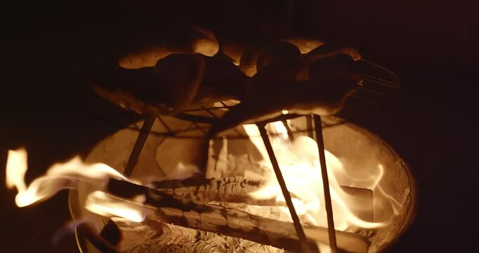 Traditional Fire-Roasted Sweet Potatoes on Open Flame
