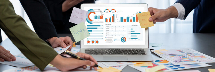 Analyst team use sticky note for creative and analytic brainstorm for business idea with BI data...