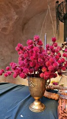 Dried beautiful flowers in vase and vegetables from the garden for interior of farmhouse