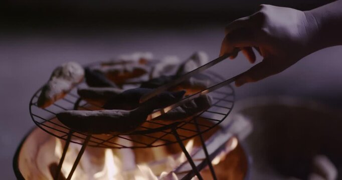 Traditional Fire-Roasted Sweet Potatoes on Open Flame