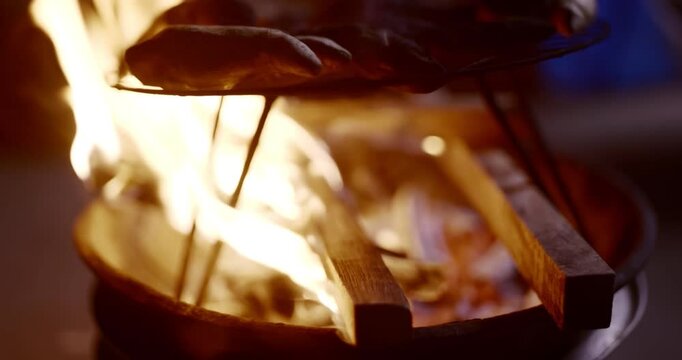 Traditional Fire-Roasted Sweet Potatoes on Open Flame