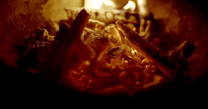 Burning Firewood and Charcoal in a Rural Kiln with Flying Fire Particles
