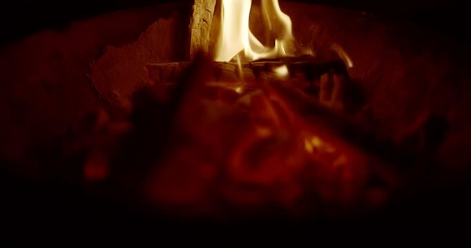 Burning Firewood and Charcoal in a Rural Kiln with Flying Fire Particles