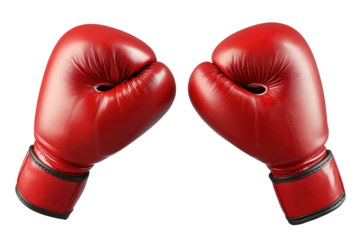 Red boxing gloves clash together in a dynamic moment capturing the intensity of sport during a match or training session