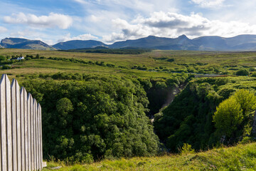 The Isle of Skye,  is a large and scenic island in the Inner Hebrides of Scotland. Carved by the...