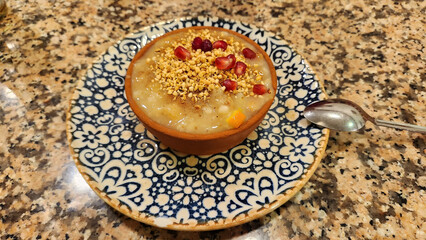 Turkish Ashura dessert in a bowl