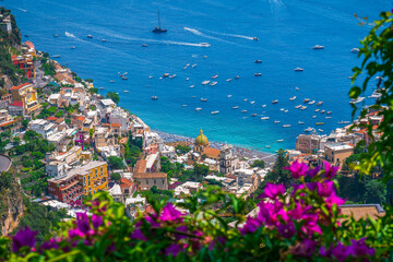 Scenic view of the colorful cliffside town of Positano on the Amalfi Coast, Italy, with traditional Mediterranean architecture and the Tyrrhenian Sea.