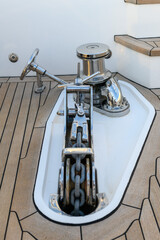 Anchor winch and cleat on superyacht. Anchoring and mooring gear on the bow of yacht. Superyacht...