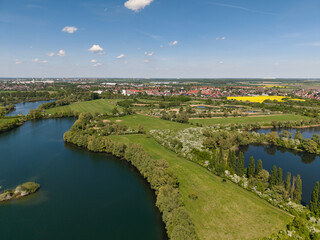Stunning and Scenic Aerial View of a Lush Green Landscape Accompanied by Glimmering Rivers Koldinger Seen Hannover Pattensen