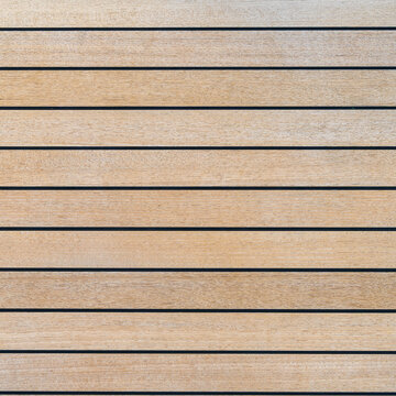 Teak wood deck texture background. Wooden deck on super yacht. Yachting concept. 