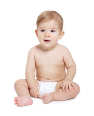 Cute little baby sitting on white background