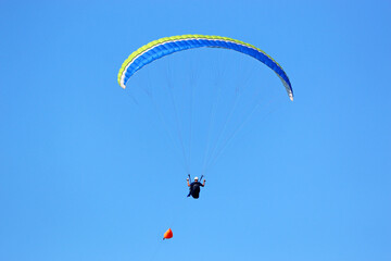 Paraglider being towed by a winch	