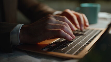It programmer pressing keyboard button using laptop busy online project closeup