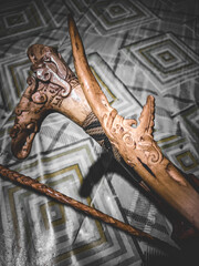 Distinctive engraving on the handle of a mandau sword typical of Borneo made from animal horns 