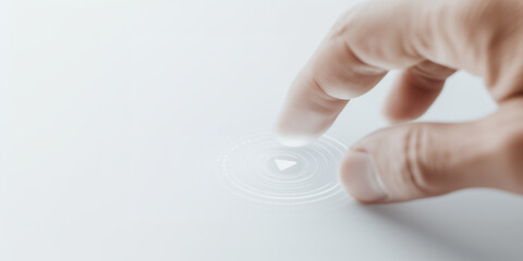 Human finger activating digital play icon on futuristic HUD interface. Minimal white background with copy space