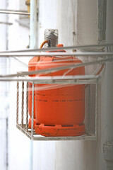 Gas. Butane bottle on the balcony of a house.