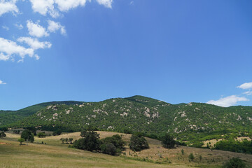 Obraz premium landscape nature mountains forest greenery blue sky Bulgaria