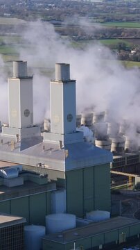 Vertical aerial view of large power station in the United Kingdom. Power grid concept	
