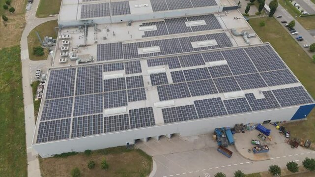 Aerial view of modern warehouse with solar panels on roof. Trnava, Slovakia