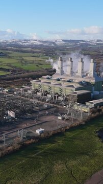 Vertical aerial view of large power station in the United Kingdom. Power grid concept	