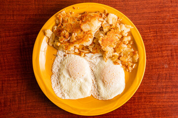 Two eggs and hash browns