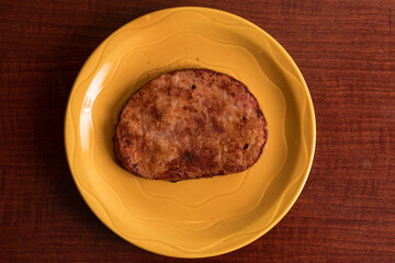 Slice of ham on a plate