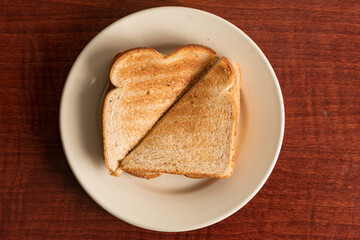 Toasted white bread on a plate