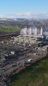 Vertical aerial view of large power station in the United Kingdom. Power grid concept	